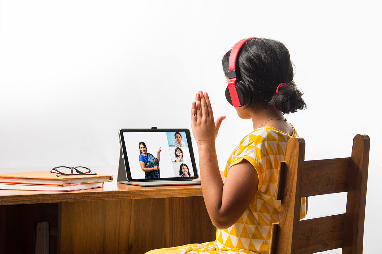Girl attending online class on laptop Girl attending online class on laptop